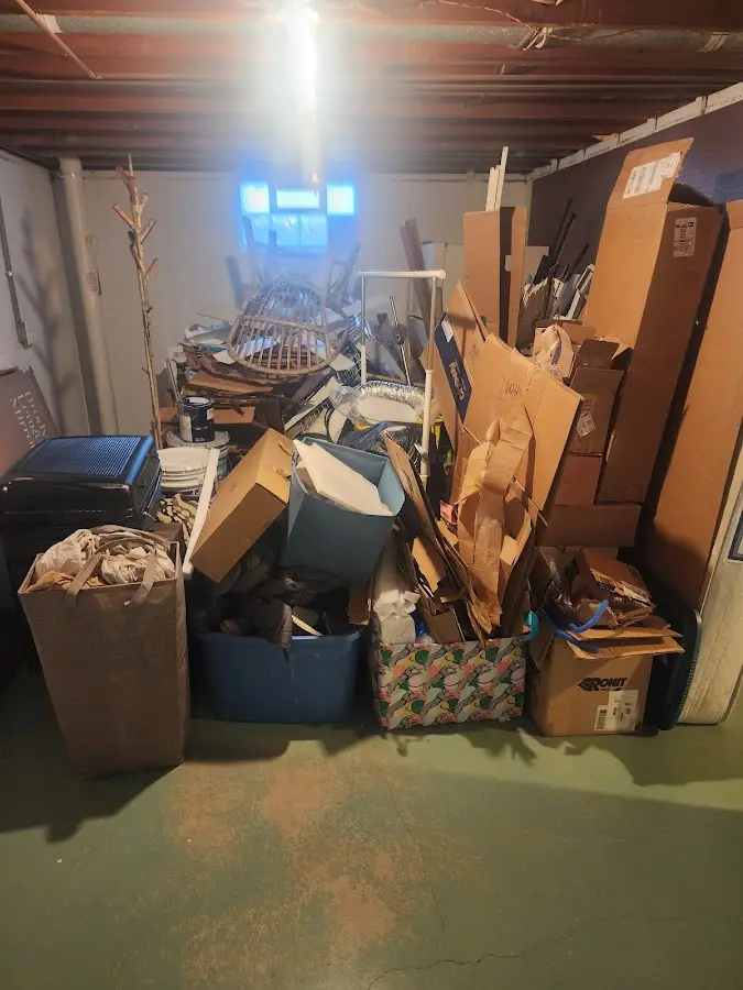 Roll-off dumpster container at job site for Yard Waste Dumpster Rental in Port St. John